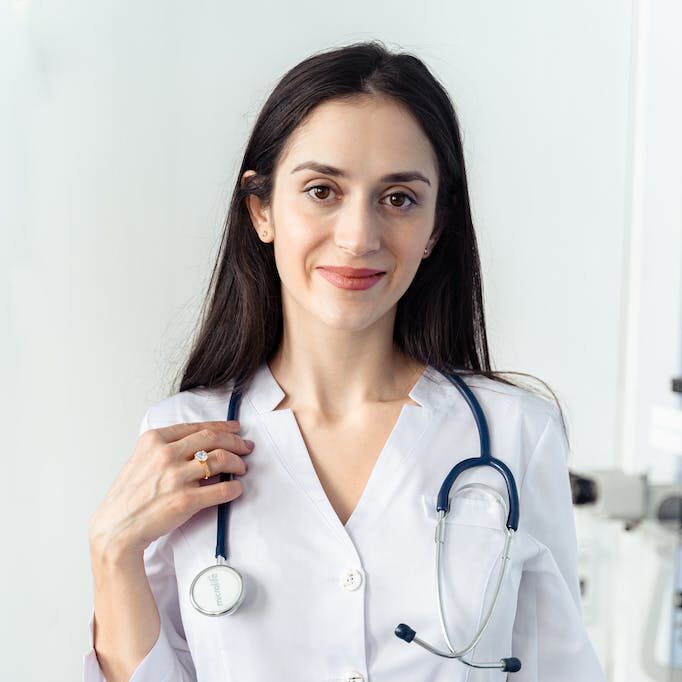 A Woman Wearing a Stethoscope